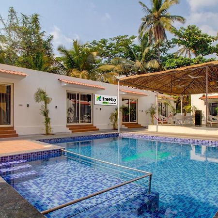 Hotel Treebo Code Red Morjim Esterno foto