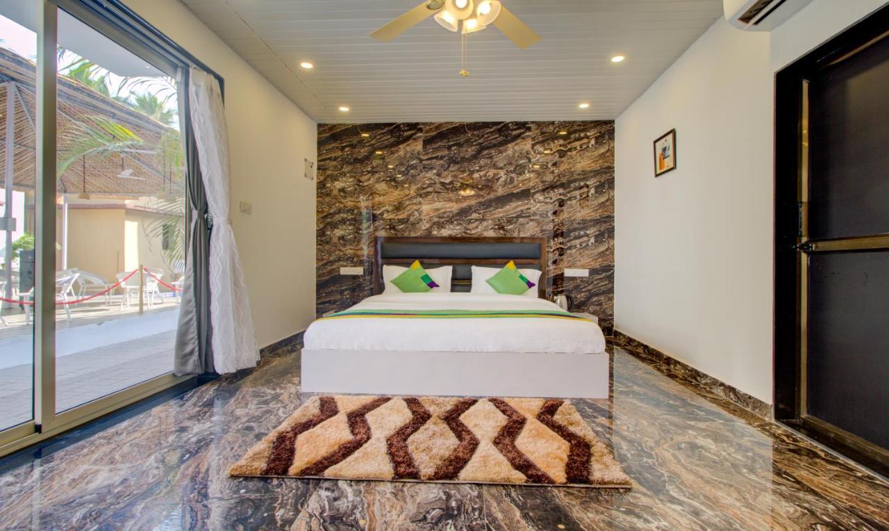 Hotel Treebo Code Red Morjim Esterno foto