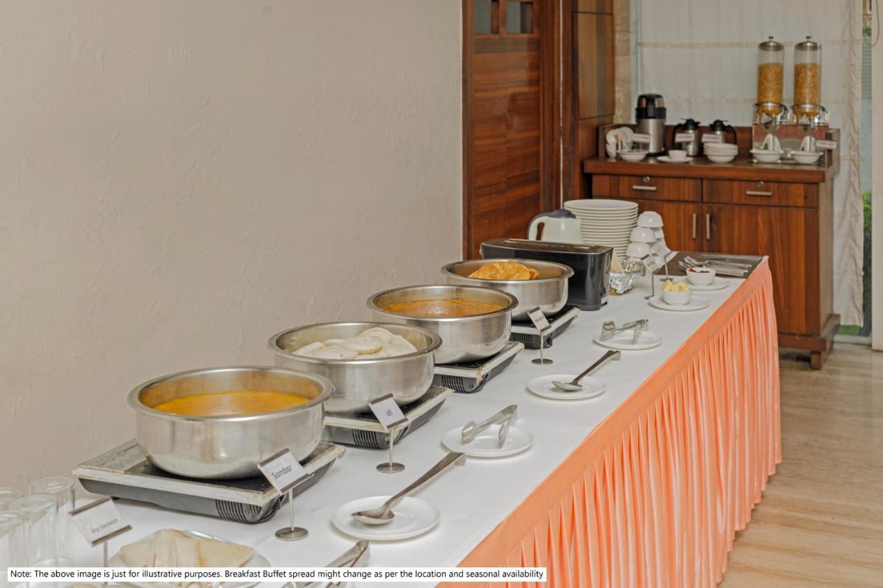 Hotel Treebo Code Red Morjim Esterno foto